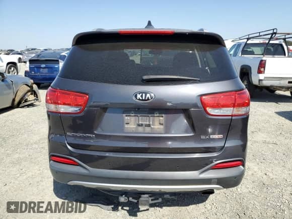 2016 Kia Sorento EX с VIN 5XYPHDA13GG020575, выставлен на аукционе Copart как лот 81833385 с пробегом 103 043 миль миль и Списание • Salvage title. История ставок и продаж доступна на DreamBid. Изображение 6.
