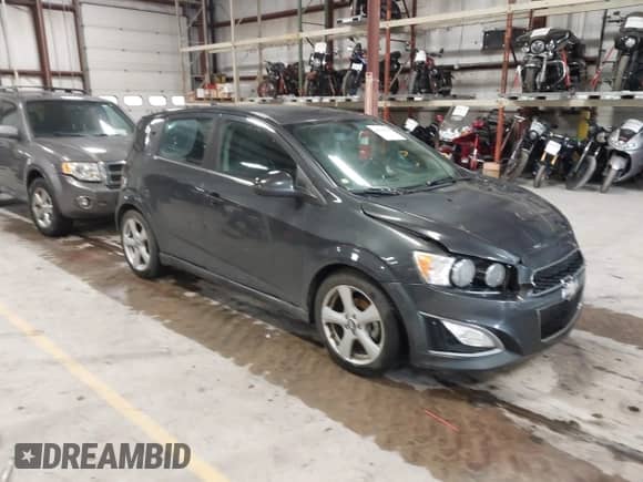 2014 Chevrolet Sonic RS with VIN 1G1JG6SB2E4231539, listed as a IAAI auction lot 42320702 with 182,765 mi miles and . Bid and sale history available at DreamBid. Image 1.