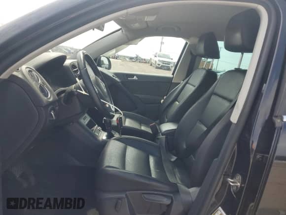 2014 Volkswagen Tiguan S with VIN WVGAV3AX6EW553772, listed as a Copart auction lot 80031625 with 149,020 mi miles and Salvage title. Bid and sale history available at DreamBid. Image 7.