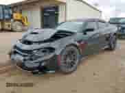2022 Dodge Charger Scat Pack Widebody with VIN 2C3CDXGJ1NH101726, listed as a Copart auction lot 83841665 with 20,379 mi miles and Salvage title. Bid and sale history available at DreamBid. Image 1.