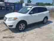 2012 Hyundai Santa Fe GLS z VIN 5XYZG3AB3CG169335, wystawiony jako IAAI lot #42869075 z przebiegiem 194 823 mil mil oraz . Historia ofert i sprzedaży dostępna na DreamBid. Obrazek 2.