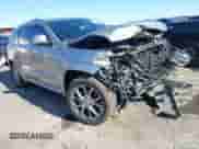 2020 Jeep Grand Cherokee Summit with VIN 1C4RJFJG2LC173184, listed as a IAAI auction lot 41343182 with 70,192 mi miles and . Bid and sale history available at DreamBid. Image 1.