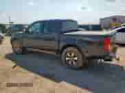 2010 Nissan Frontier SE with VIN 1N6AD0EVXAC409021, listed as a Copart auction lot 68933195 with 202,371 mi miles and Salvage title. Bid and sale history available at DreamBid. Image 2.
