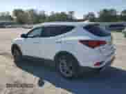 2018 Hyundai Santa Fe 2.4L z VIN 5NMZU3LB6JH088032, wystawiony jako Copart lot #86129015 z przebiegiem 157 606 mil mil oraz Czysty tytuł • Clean title. Historia ofert i sprzedaży dostępna na DreamBid. Obrazek 2.