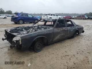 1988 Chevrolet Caprice Classic с VIN 1G1BN51H2JR136129, выставлен на аукционе Copart как лот 43623175 с пробегом Не указан миль и На запчасти • Non repairable. История ставок и продаж доступна на DreamBid. Изображение 1.
