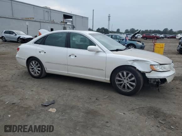 2007 Hyundai Azera SE с VIN KMHFC46F07A216158, выставлен на аукционе Copart как лот 83764395 с пробегом 156 324 миль миль и Списание • Salvage title. История ставок и продаж доступна на DreamBid. Изображение 4.