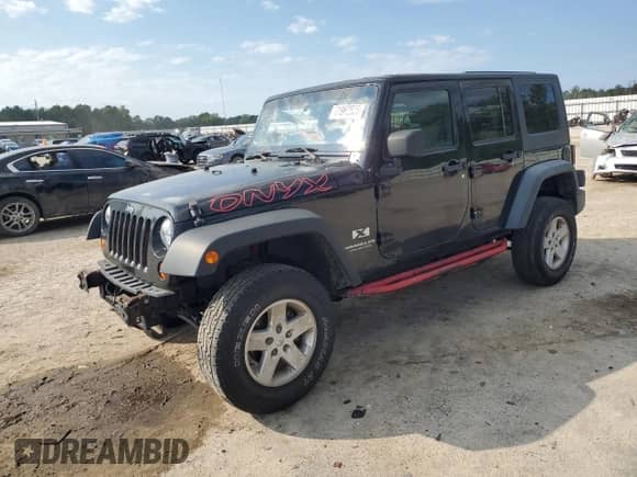 2008 Jeep Wrangler Unlimited X z VIN 1J4GA391X8L616091, wystawiony jako Copart lot #71962505 z przebiegiem 130 040 mil mil oraz Szkoda całkowita • Salvage title. Historia ofert i sprzedaży dostępna na DreamBid. Obrazek 1.
