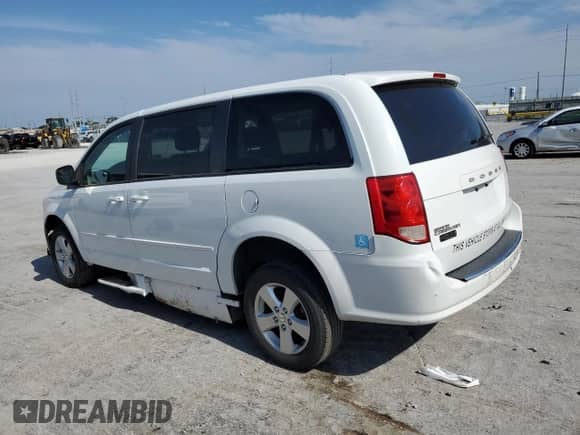 2016 Dodge Grand Caravan SE z VIN 2C4RDGBG1GR400969, wystawiony jako Copart lot #65642405 z przebiegiem 252 022 mil mil oraz Czysty tytuł • Clean title. Historia ofert i sprzedaży dostępna na DreamBid. Obrazek 2.