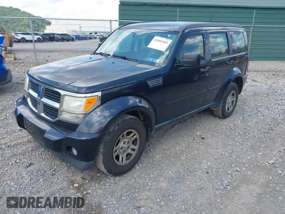 2011 Dodge Nitro SE with VIN 1D4PU2GK8BW599285, listed as a IAAI auction lot 42601484 with 192,579 mi miles and . Bid and sale history available at DreamBid. Image 17.