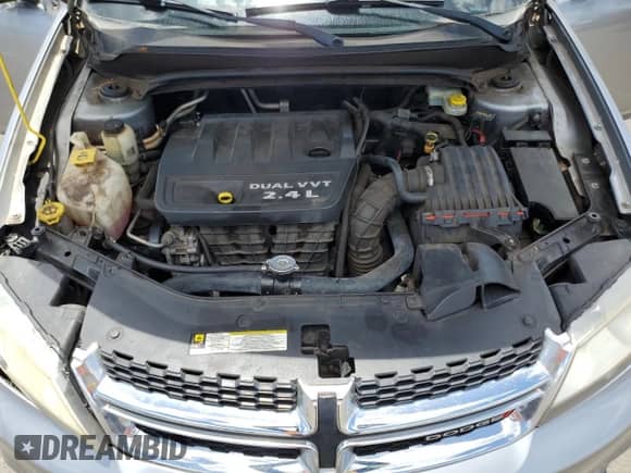 2013 Dodge Avenger SE с VIN 1C3CDZAB3DN650976, выставлен на аукционе Copart как лот 70727985 с пробегом 142 228 миль миль и Списание • Salvage title. История ставок и продаж доступна на DreamBid. Изображение 11.
