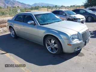 2005 Chrysler 300 C with VIN 2C3JA63H45H522482, listed as a IAAI auction lot 43295388 with 164,640 mi miles and . Bid and sale history available at DreamBid. Image 1.