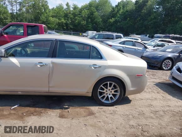 2012 Chevrolet Malibu LTZ 1LZ z VIN 1G1ZE5E01CF202886, wystawiony jako IAAI lot #42657088 z przebiegiem 143 413 mil mil oraz . Historia ofert i sprzedaży dostępna na DreamBid. Obrazek 6.