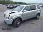 2014 Honda Pilot Touring with VIN 5FNYF4H97EB051760, listed as a IAAI auction lot 43329833 with 220,273 mi miles and . Bid and sale history available at DreamBid. Image 18.