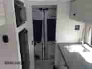 2023 Ram ProMaster Cargo with VIN 3C6LRVBG1PE601128, listed as a IAAI auction lot 41249354 with Not provided miles and . Bid and sale history available at DreamBid. Image 12.