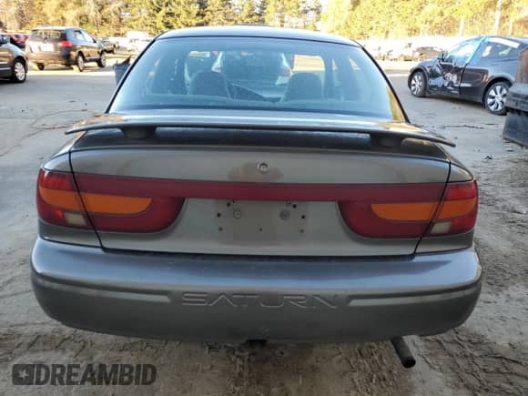 2000 Saturn SL with VIN 1G8ZJ5274YZ256204, listed as a Copart auction lot 79502124 with 190,120 mi miles and Salvage title. Bid and sale history available at DreamBid. Image 6.