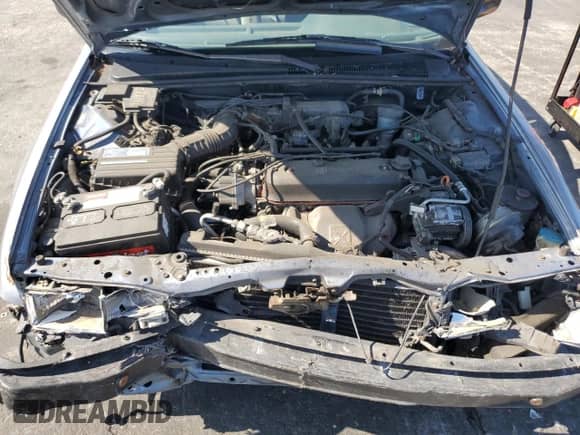 1990 Honda Accord LX with VIN JHMCB7652LC076386, listed as a Copart auction lot 57727165 with 245,375 mi miles and Salvage title. Bid and sale history available at DreamBid. Image 11.