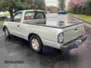 2003 Toyota Tacoma with VIN 5TENL42NX3Z150327, listed as a Copart auction lot 52352315 with 187,733 mi miles and Salvage title. Bid and sale history available at DreamBid. Image 3.