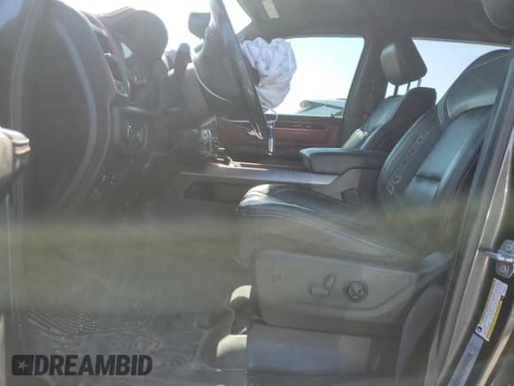 2020 Ram 1500 Rebel z VIN 1C6SRFLT0LN233317, wystawiony jako Copart lot #70363135 z przebiegiem 124 850 mil mil oraz Szkoda całkowita • Salvage title. Historia ofert i sprzedaży dostępna na DreamBid. Obrazek 7.