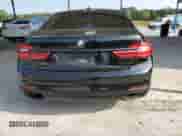 2016 BMW 7 Series 740i z VIN WBA7E2C52GG504132, wystawiony jako Copart lot #81092345 z przebiegiem 139 249 mil mil oraz Czysty tytuł • Clean title. Historia ofert i sprzedaży dostępna na DreamBid. Obrazek 6.