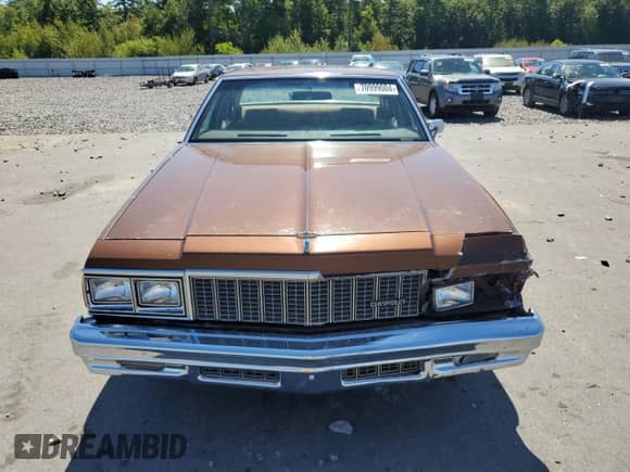 1979 Chevrolet Impala with VIN 1N69G9S303908, listed as a Copart auction lot 70999004 with 47,489 mi miles and Salvage title. Bid and sale history available at DreamBid. Image 5.