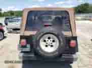 1999 Jeep Wrangler Sahara с VIN 1J4FY49S6XP432277, выставлен на аукционе Copart как лот 61622585 с пробегом 113 390 миль миль и Списание • Salvage title. История ставок и продаж доступна на DreamBid. Изображение 6.
