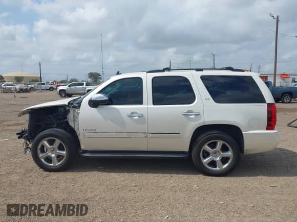 2012 Chevrolet Tahoe LTZ z VIN 1GNSCCE00CR220286, wystawiony jako IAAI lot #42130251 z przebiegiem 186 792 mil mil oraz . Historia ofert i sprzedaży dostępna na DreamBid. Obrazek 15.