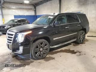 2015 Cadillac Escalade Premium z VIN 1GYS4CKJ4FR233141, wystawiony jako Copart lot #87204115 z przebiegiem 103 935 mil mil oraz Szkoda całkowita • Salvage title. Historia ofert i sprzedaży dostępna na DreamBid. Obrazek 1.