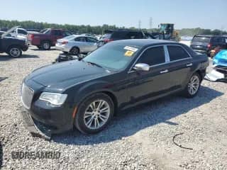 2015 Chrysler 300 C с VIN 2C3CCAEG2FH802705, выставлен на аукционе Copart как лот 69123995 с пробегом 136 370 миль миль и Списание • Salvage title. История ставок и продаж доступна на DreamBid. Изображение 1.