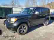 2011 Dodge Nitro SXT z VIN 1D4PU5GK5BW575754, wystawiony jako Copart lot #79841234 z przebiegiem 246 589 mil mil oraz Szkoda całkowita • Salvage title. Historia ofert i sprzedaży dostępna na DreamBid. Obrazek 1.
