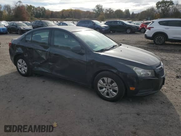 2014 Chevrolet Cruze LS with VIN 1G1PB5SH5E7277291, listed as a Copart auction lot 89549265 with 169,517 mi miles and Salvage title. Bid and sale history available at DreamBid. Image 4.