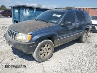 2001 Jeep Grand Cherokee Laredo с VIN 1J4GW48S21C693190, выставлен на аукционе Copart как лот 80888225 с пробегом 428 569 миль миль и Списание • Salvage title. История ставок и продаж доступна на DreamBid. Изображение 1.