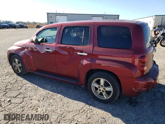 2009 Chevrolet HHR 1LT with VIN 3GNCA23B49S590428, listed as a Copart auction lot 76938344 with 142,357 mi miles and Salvage title. Bid and sale history available at DreamBid. Image 2.