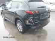 2023 Mazda CX-5 S Carbon Edition z VIN JM3KFBCM3P0126856, wystawiony jako IAAI lot #42020069 z przebiegiem 9 728 mil mil oraz . Historia ofert i sprzedaży dostępna na DreamBid. Obrazek 6.