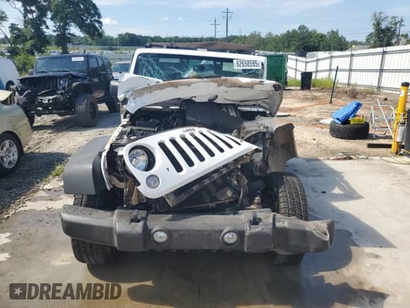 2018 Jeep Wrangler Sport S с VIN 1C4GJWAG3JL923728, выставлен на аукционе Copart как лот 62658595 с пробегом Не указан миль и На запчасти • Non repairable. История ставок и продаж доступна на DreamBid. Изображение 5.