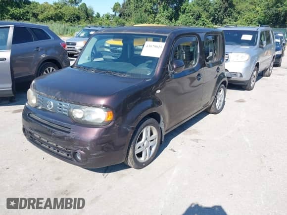 2009 Nissan Cube SL с VIN JN8AZ28R49T121090, выставлен на аукционе IAAI как лот 43079825 с пробегом 153 243 миль миль и . История ставок и продаж доступна на DreamBid. Изображение 2.