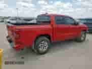 2024 Nissan Frontier Pro-4X with VIN 1N6ED1EK6RN641533, listed as a Copart auction lot 65434245 with 19,119 mi miles and Salvage title. Bid and sale history available at DreamBid. Image 3.