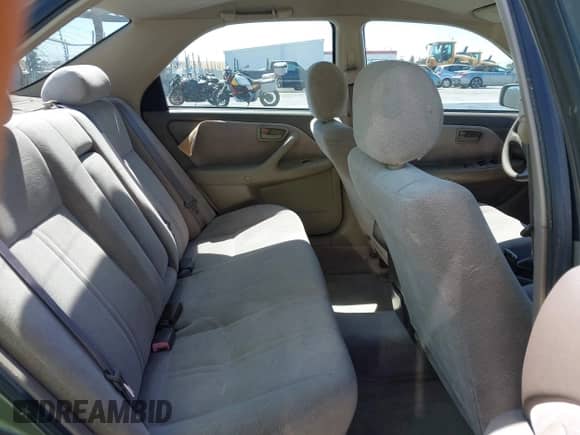 1997 Toyota Camry LE z VIN JT2BF22K6V0076534, wystawiony jako IAAI lot #42648829 z przebiegiem 258 244 mil mil oraz . Historia ofert i sprzedaży dostępna na DreamBid. Obrazek 8.