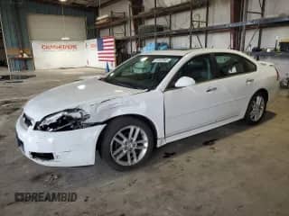 2012 Chevrolet Impala LTZ with VIN 2G1WC5E30C1221083, listed as a Copart auction lot 81643965 with 153,674 mi miles and Salvage title. Bid and sale history available at DreamBid. Image 1.