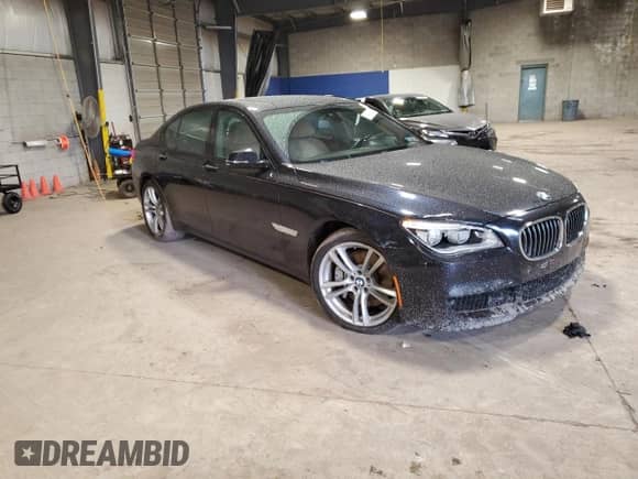 2014 BMW 7 Series 750i xDrive с VIN WBAYB6C55ED224739, выставлен на аукционе Copart как лот 84935364 с пробегом 173 805 миль миль и Списание • Salvage title. История ставок и продаж доступна на DreamBid. Изображение 4.