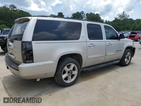 2008 Chevrolet Suburban LTZ with VIN 1GNFC16J38R129579, listed as a Copart auction lot 62200415 with 265,399 mi miles and Salvage title. Bid and sale history available at DreamBid. Image 3.
