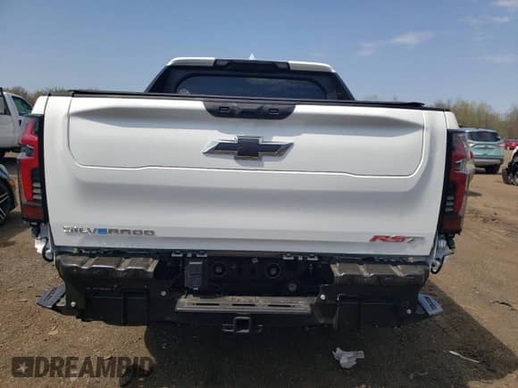 2024 Chevrolet Silverado EV RST с VIN 1GC40ZEL9RU301932, выставлен на аукционе Copart как лот 54297145 с пробегом 5 502 миль миль и Списание • Salvage title. История ставок и продаж доступна на DreamBid. Изображение 6.