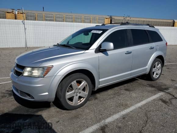 2010 Dodge Journey R/T with VIN 3D4PH9FV9AT265571, listed as a Copart auction lot 89720255 with 169,801 mi miles and Salvage title. Bid and sale history available at DreamBid. Image 1.