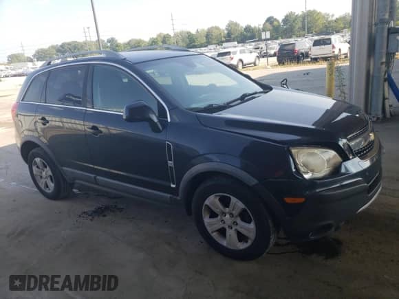 2014 Chevrolet Captiva Sport LS with VIN 3GNAL2EK7ES523864, listed as a Copart auction lot 69399374 with 249,277 mi miles and Clean title. Bid and sale history available at DreamBid. Image 4.