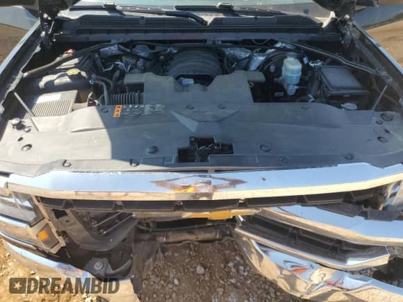 2018 Chevrolet Silverado 1500 LT с VIN 3GCUKREC7JG359703, выставлен на аукционе Copart как лот 69539785 с пробегом 243 935 миль миль и Списание • Salvage title. История ставок и продаж доступна на DreamBid. Изображение 11.