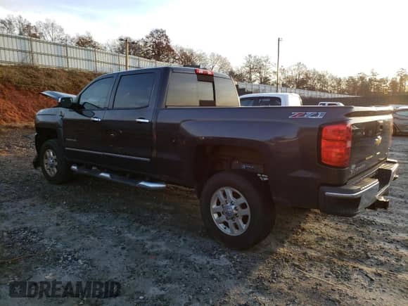 2015 Chevrolet Silverado 2500HD LTZ with VIN 1GC1KWE8XFF118790, listed as a Copart auction lot 69670822 with 256,743 mi miles and Salvage title. Bid and sale history available at DreamBid. Image 2.