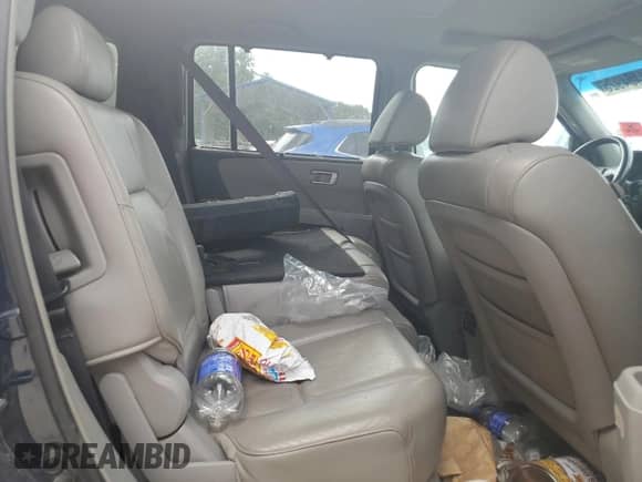 2009 Honda Pilot Touring with VIN 5FNYF48999B016322, listed as a Copart auction lot 71404925 with 205,468 mi miles and Salvage title. Bid and sale history available at DreamBid. Image 11.