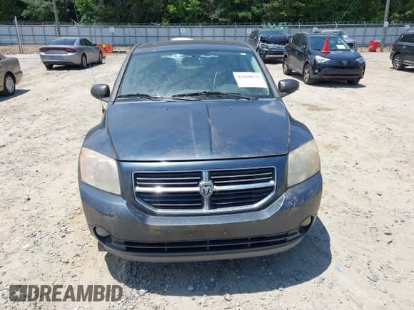 2008 Dodge Caliber R/T with VIN 1B3HB78K98D601585, listed as a IAAI auction lot 42660679 with 198,871 mi miles and . Bid and sale history available at DreamBid. Image 6.