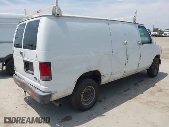 2004 Ford Econoline Cargo with VIN 1FTNE24L34HB22513, listed as a IAAI auction lot 42750314 with 221,334 mi miles and . Bid and sale history available at DreamBid. Image 4.