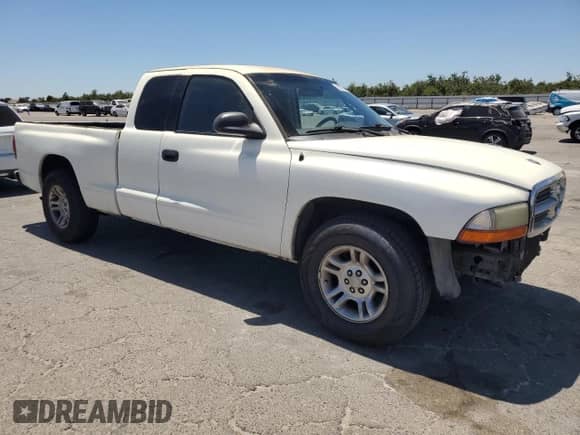 2001 Dodge Dakota с VIN 1B7GL22X61S284459, выставлен на аукционе Copart как лот 65877245 с пробегом 239 965 миль миль и Списание • Salvage title. История ставок и продаж доступна на DreamBid. Изображение 4.