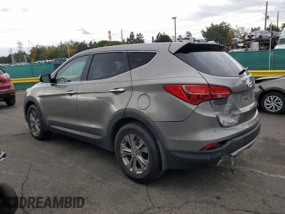 2014 Hyundai Santa Fe z VIN 5XYZT3LB1EG149273, wystawiony jako Copart lot #83761825 z przebiegiem 50 559 mil mil oraz Szkoda całkowita • Salvage title. Historia ofert i sprzedaży dostępna na DreamBid. Obrazek 2.